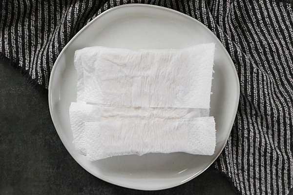 pressing liquid out of tofu