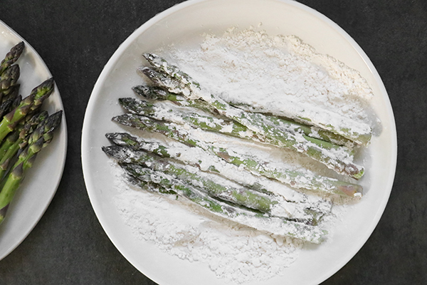 coating asparagus in flour