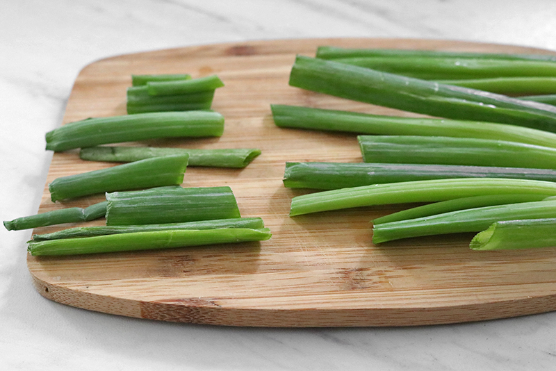 cut off tips of green onions