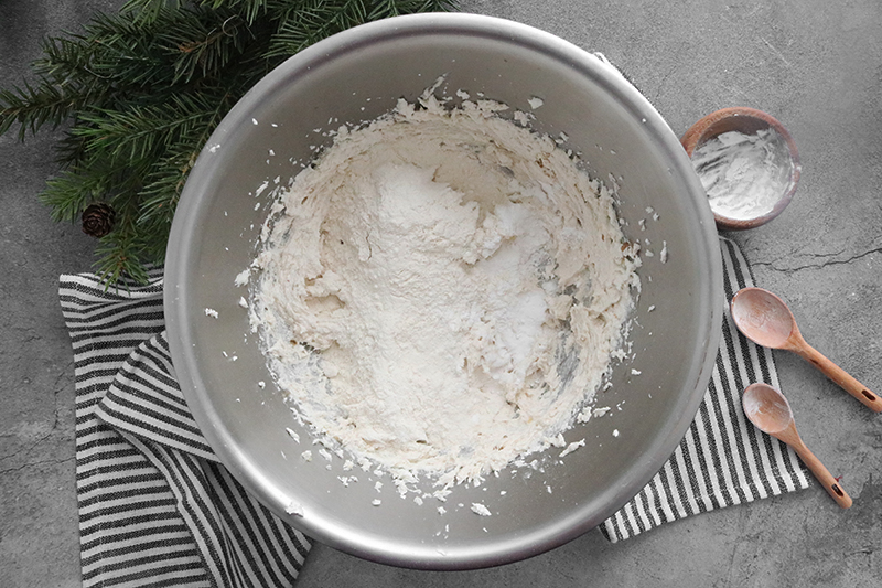 sugar cookie ingredients in a mixing bowl