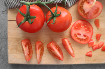tomato slices on a cutting board