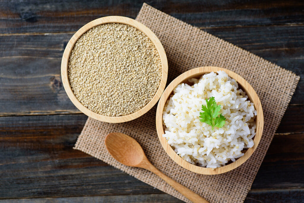 Cooked Rice With Quinoa Seed In A Bowl On Wooden Background