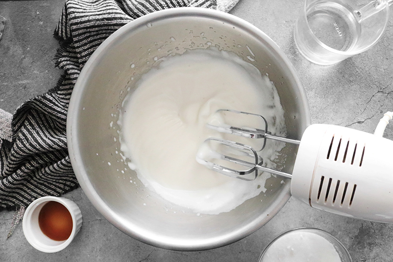 mixing marshmallow ingredients in a bowl