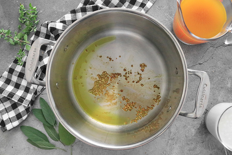 garlic browned in avocado oil in a large pot