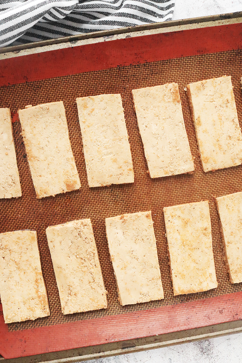 marinated tofu on a silicone baking mat