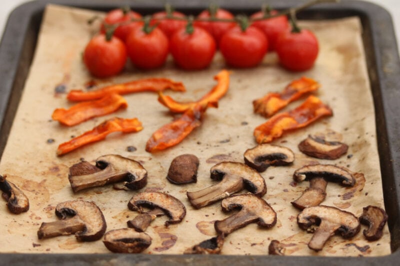 Roasted tomatoes, thinly sliced carrots, and mushrooms.