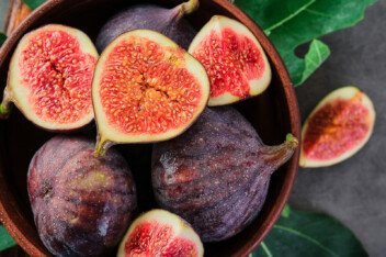 Fresh sliced figs in a bowl.