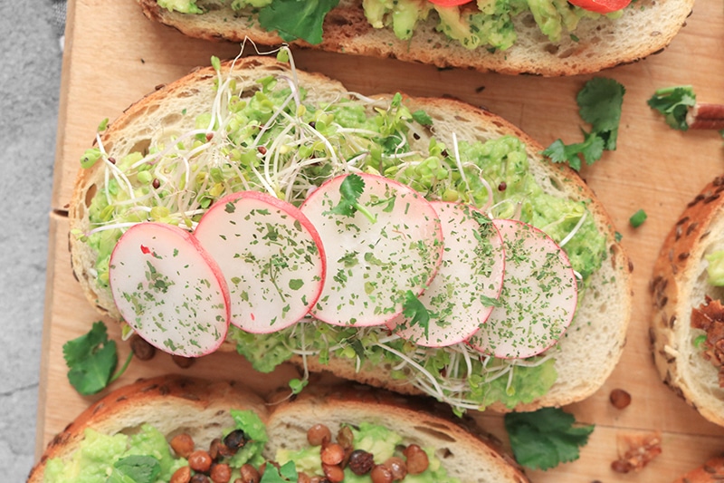 Avocado Toast with sprouts and radishes