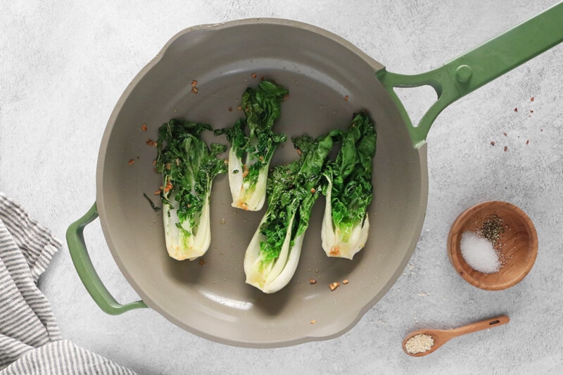 Cook bok choy in a skillet
