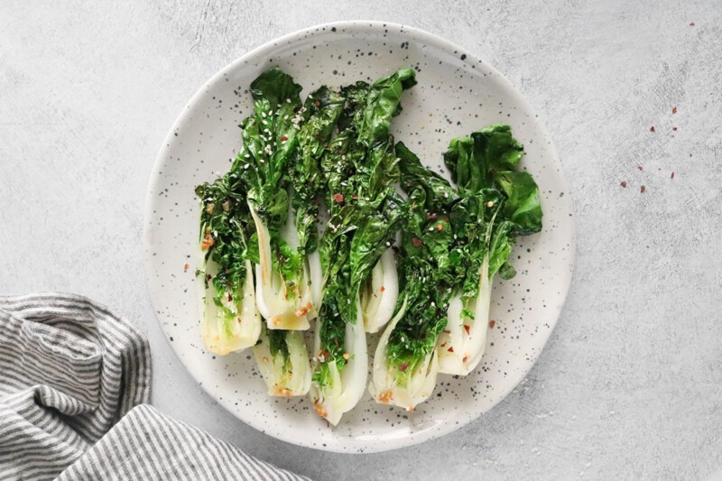 Cooked bok choy on a plate