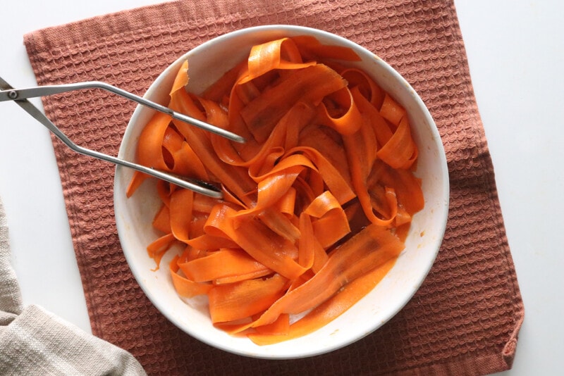 Carrot strips in soy sauce marinade