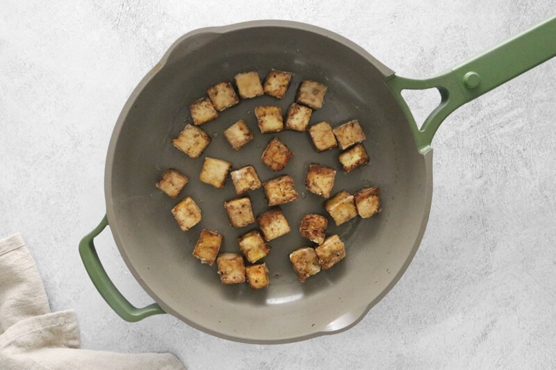 fry tofu until it's crispy in a skillet