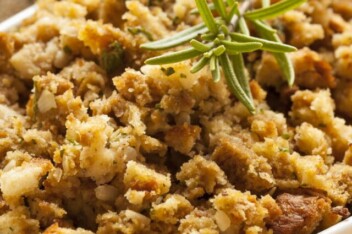Homemade Thanksgiving stuffing in a white casserole dish