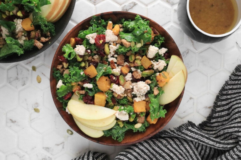 Fall Harvest Salad with Maple Vinaigrette in a wooden bowl