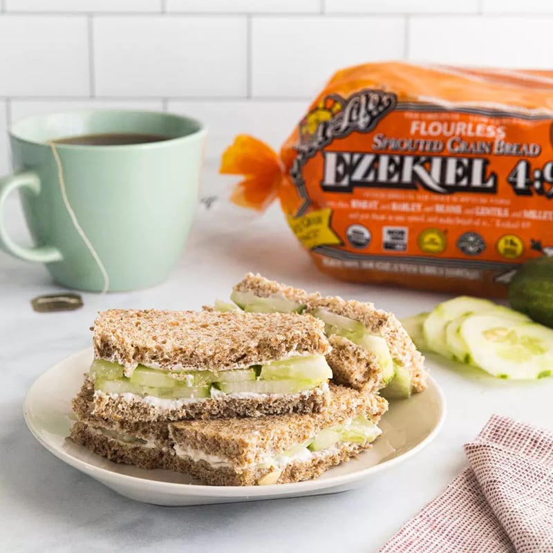 A cucumber sandwich made out of Food for Life's Ezekiel 4:9 Sprouted Whole Grain Bread.