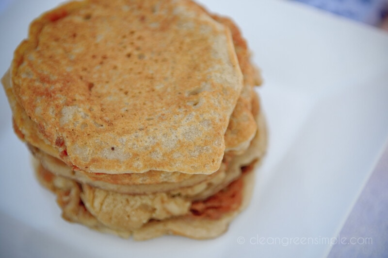 Gluten-free vegan pancakes on a while plate.