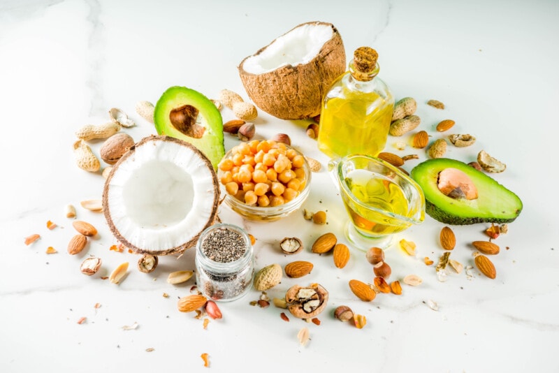 Healthy fat sources including nuts, seeds, avocados, and oils.