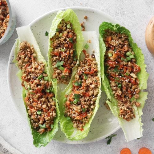 Vegan lettuce wraps on a white plate