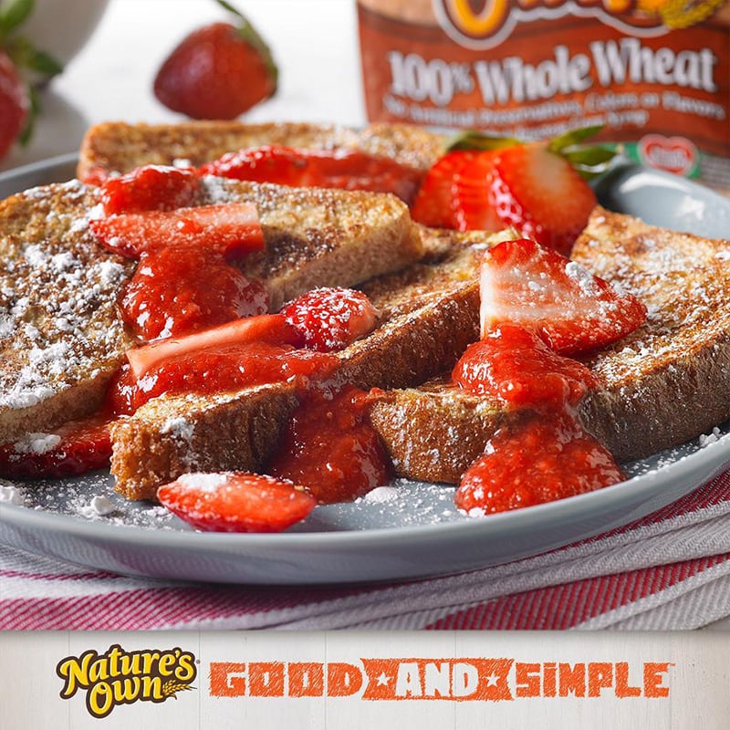 Strawberry jam toast made out of Nature's Own 100% Whole Wheat.