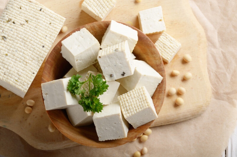 Raw tofu cubes in a bowl.