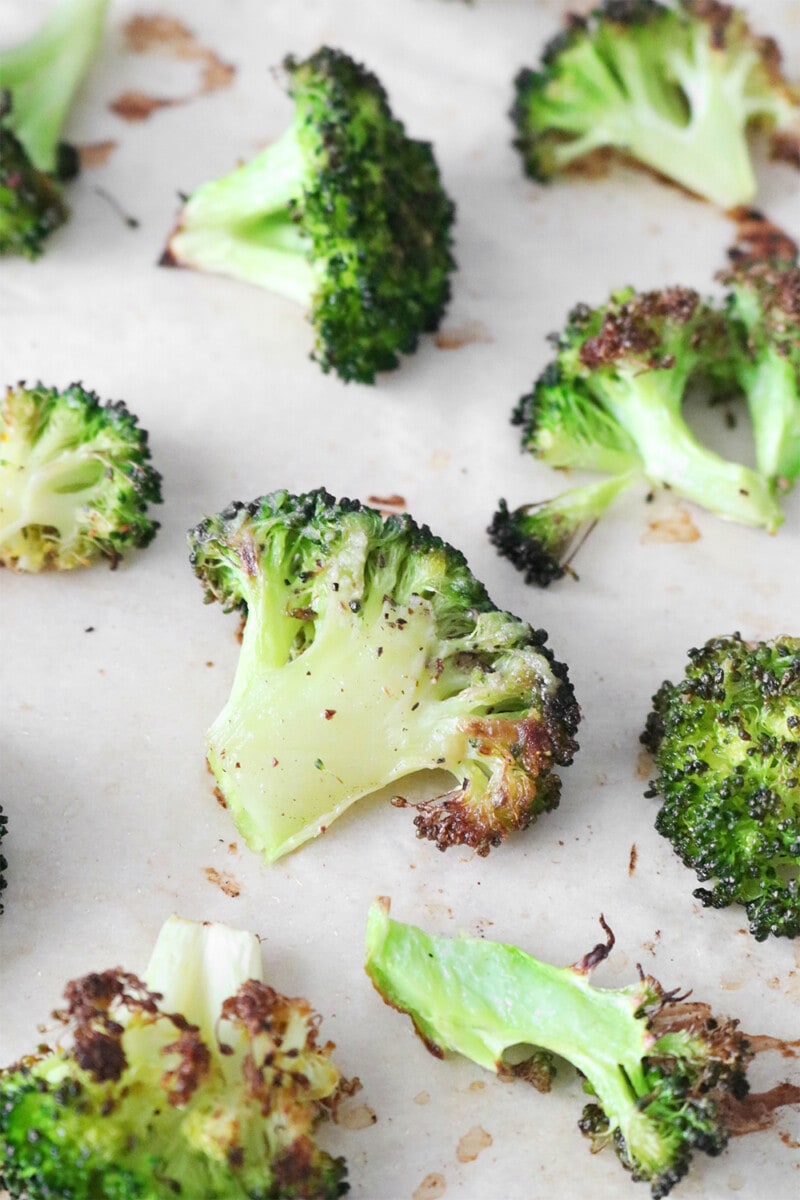 Roasted broccoli on a baking sheet