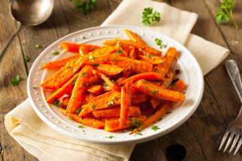 Roasted carrots on a white dish
