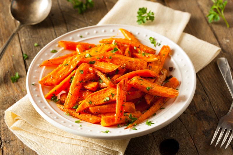 Roasted carrots on a white dish