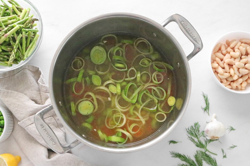 Vegetable broth simmering in a pot.