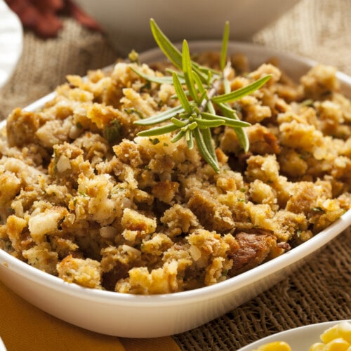Homemade Thanksgiving stuffing in a white casserole dish