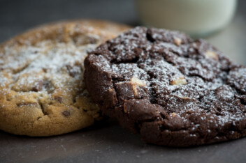 Two cookies: chocolate and nuts.