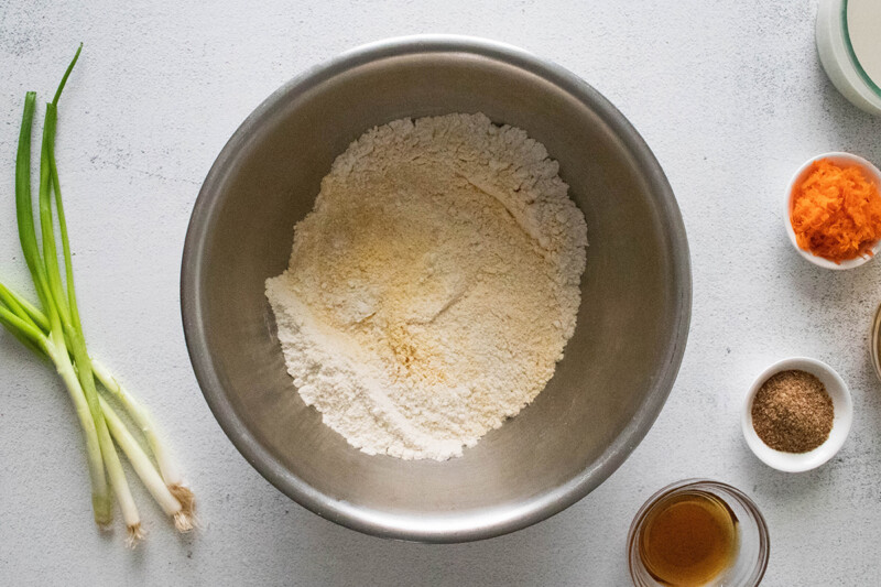 Dry ingredients for cornbread in a bowl.