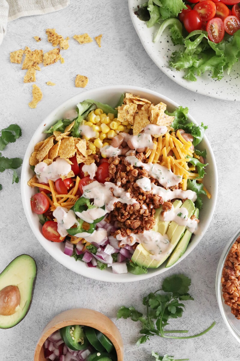 Vegan taco salad in a white bowl.