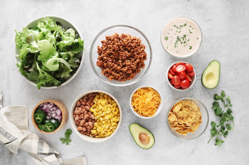 Top view of ingredients for vegan taco salad.