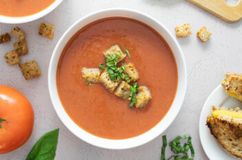 Vegan tomato soup in a white bowl