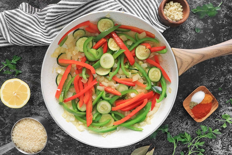 Peppers, onions, and zucchini in a skillet