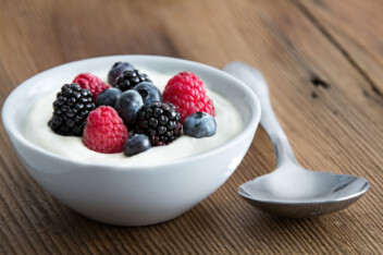 Vegan yogurt with raspberries, blackberries, and blueberries